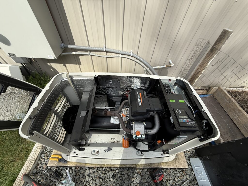 Generac standby generator with panel open for repair service